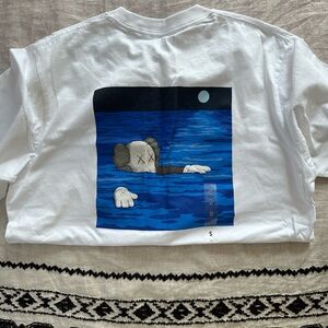 KAWS x Uniqlo UT Short Sleeve graphic tee. New never worn.